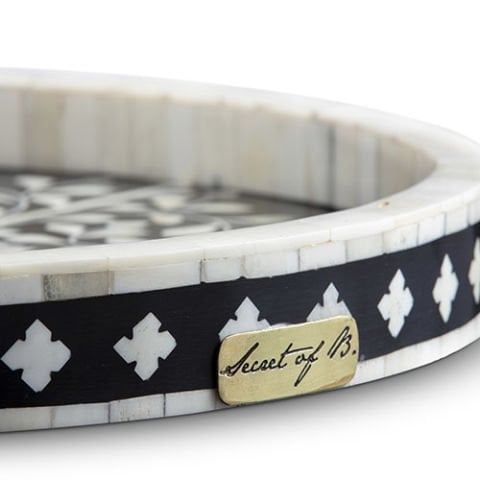 Black and white floral-patterned mother-of-pearl inlaid round tray