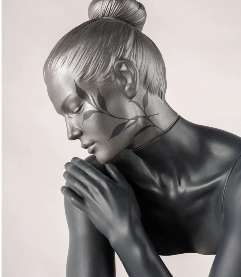HER SCULPTURE
