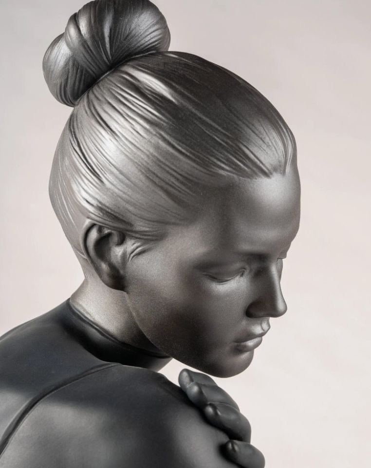 HER SCULPTURE