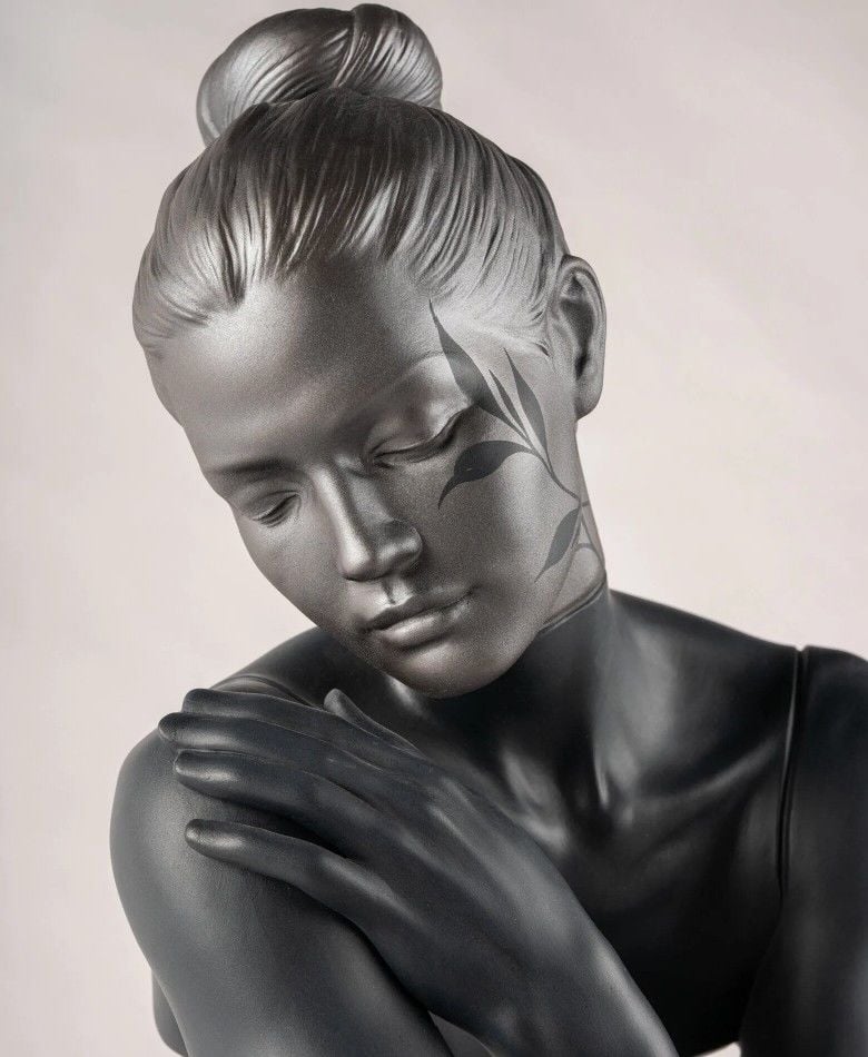 HER SCULPTURE