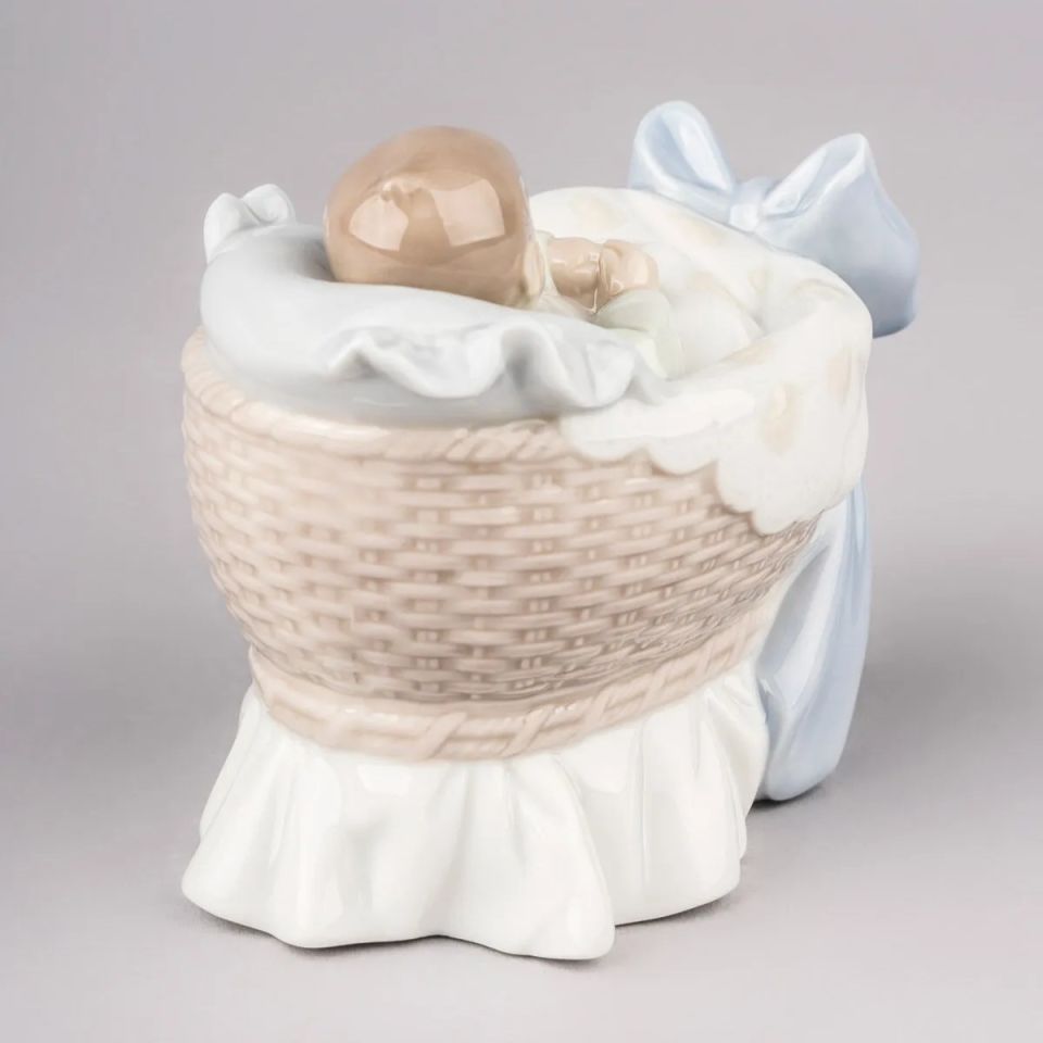 A NEW TREASURE BOY FIGURINE