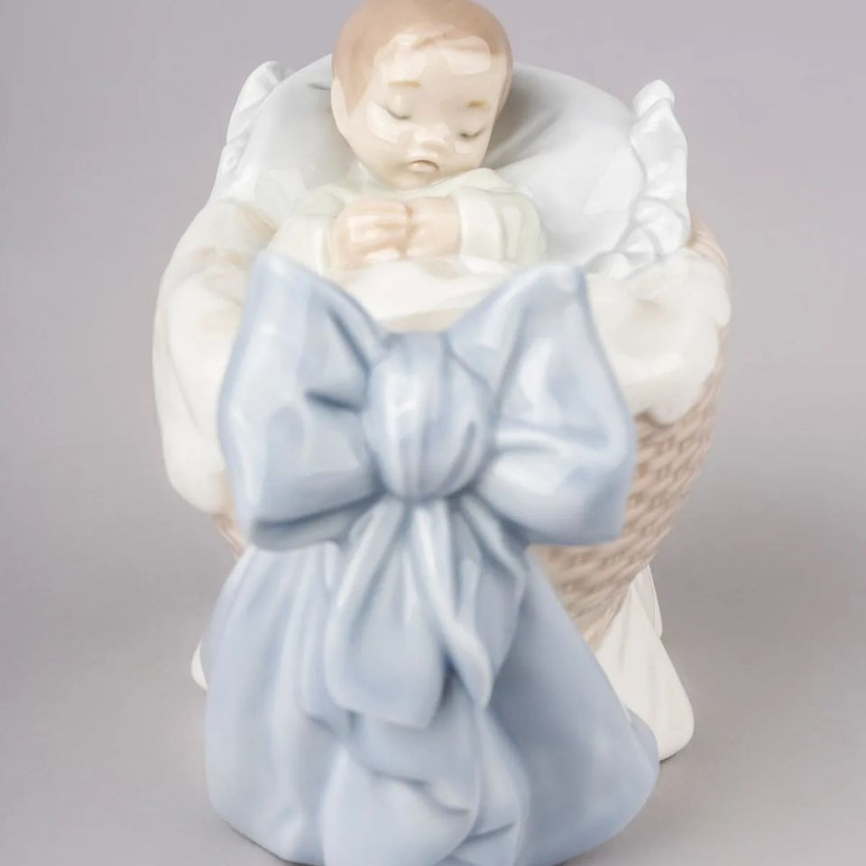 A NEW TREASURE BOY FIGURINE