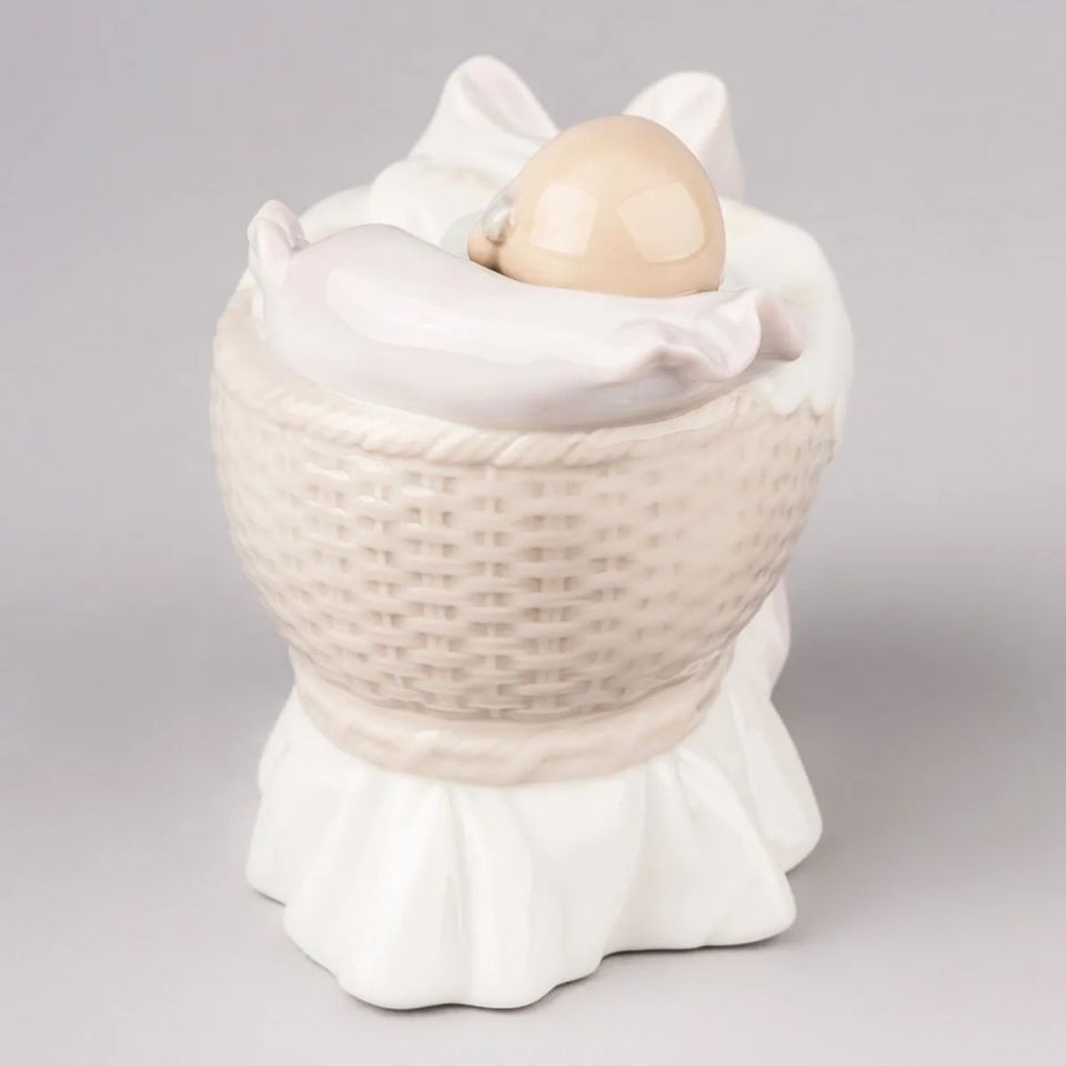 A NEW TREASURE GIRL FIGURINE