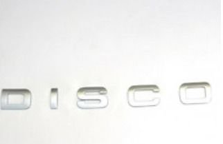 LR063638 - ÖN DİSCO YAZI/BRUNEL (DİSC.SPORT) - Land Rover