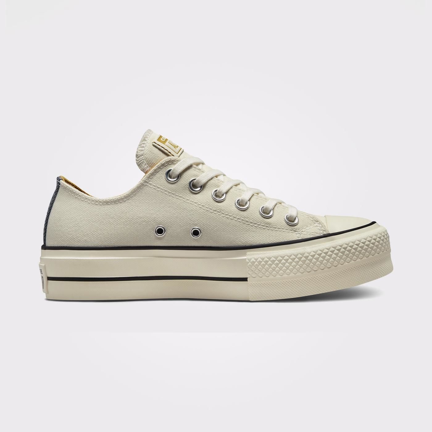 Converse quito xl hot sale