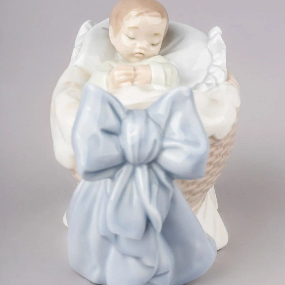A NEW TREASURE BOY FIGURINE