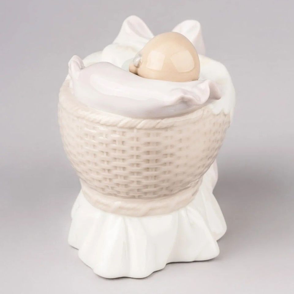 A NEW TREASURE GIRL FIGURINE