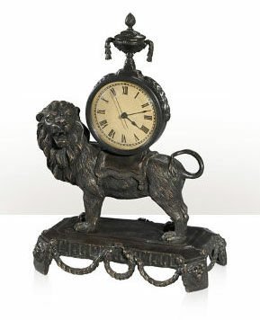 A VERDIGRIS BRASS MANTLE CLOCK