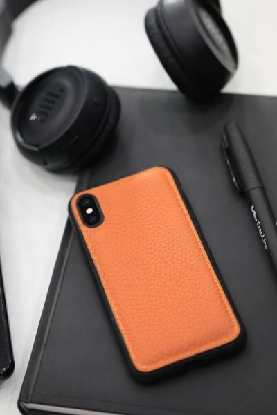 حافظة جلدية برتقالية اللون لهاتف iPhone X / XS