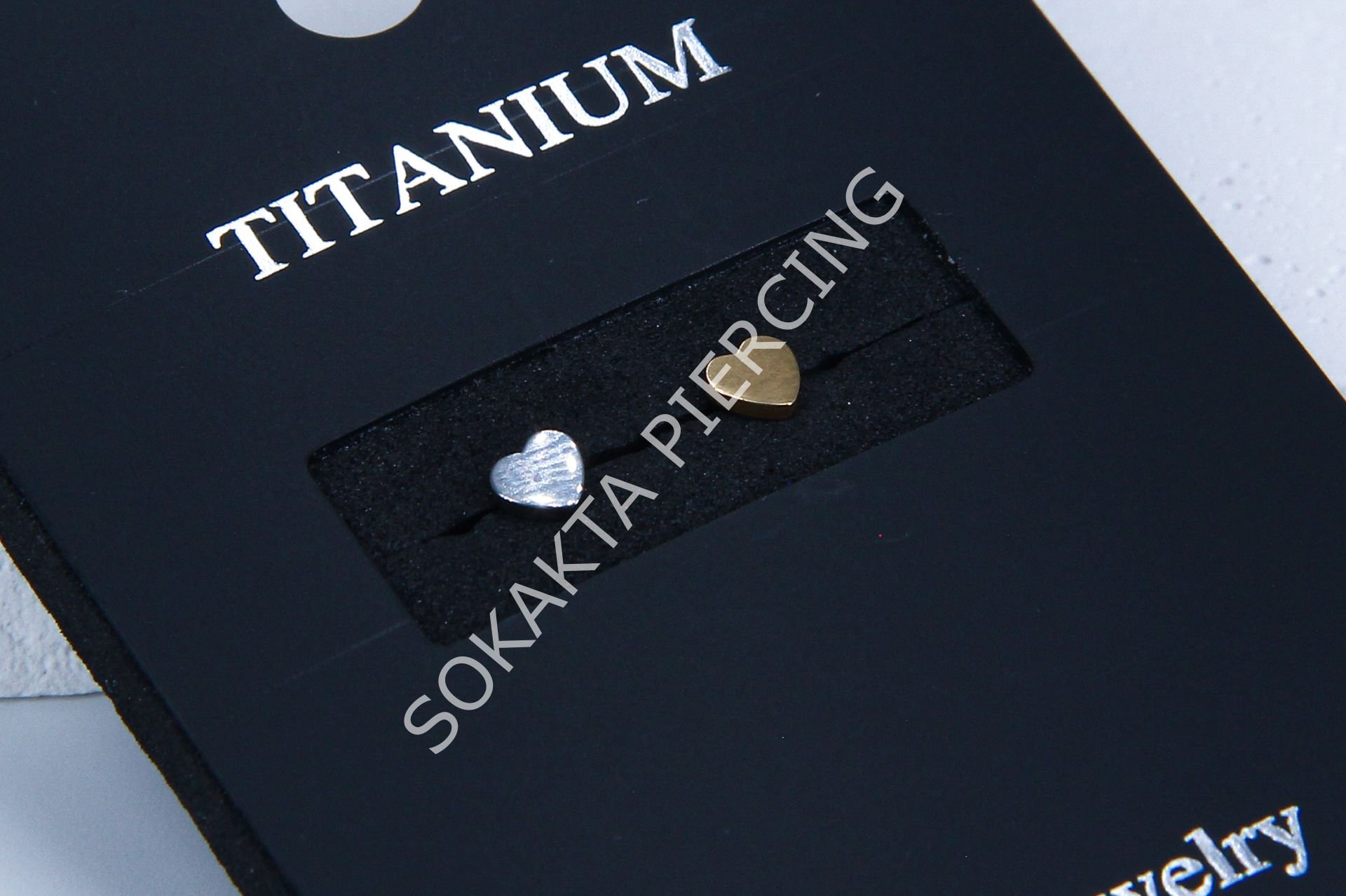 TITANIUM TRAGUS