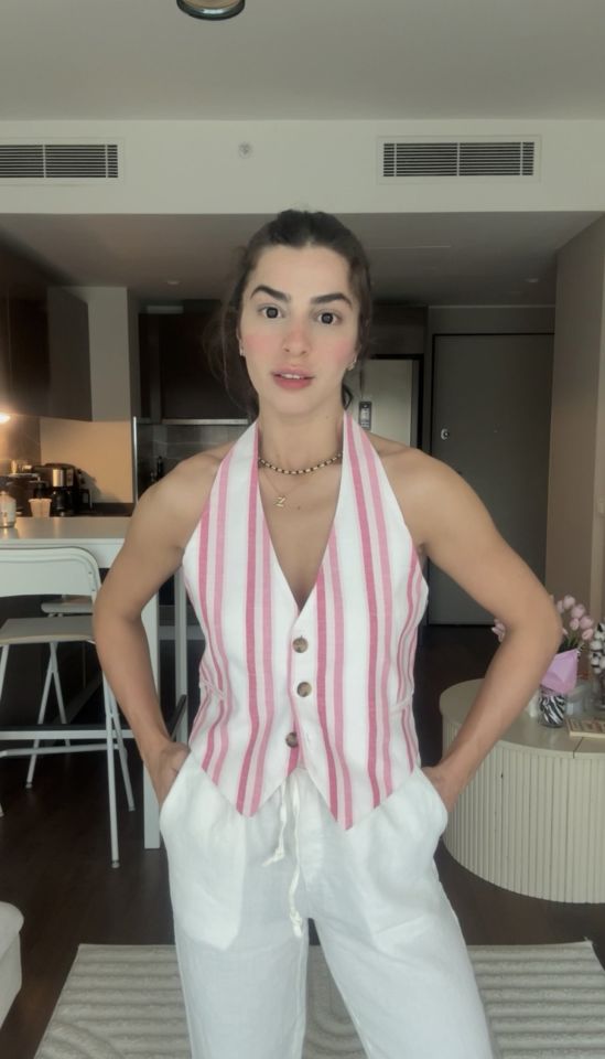 Pembe çizgili sırtı açık yelek