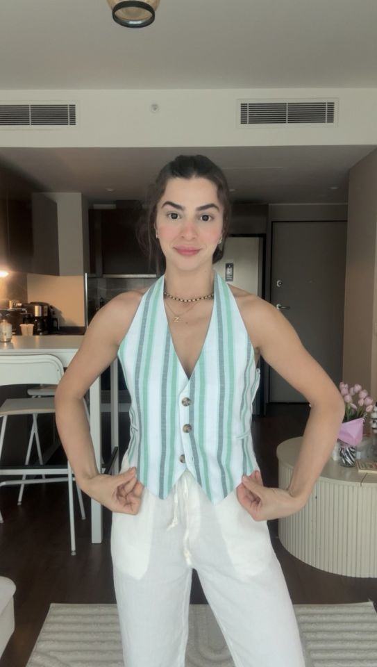 Yeşil çizgili sırtı açık yelek