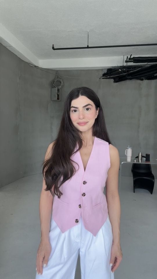Tatlı pembe v yaka yelek