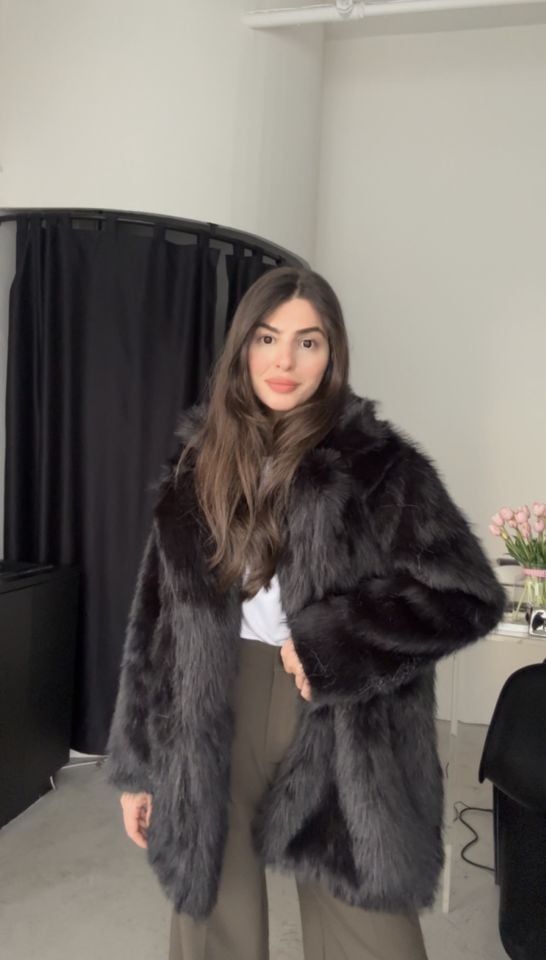İçi astarlı dolgun siyah kürk
