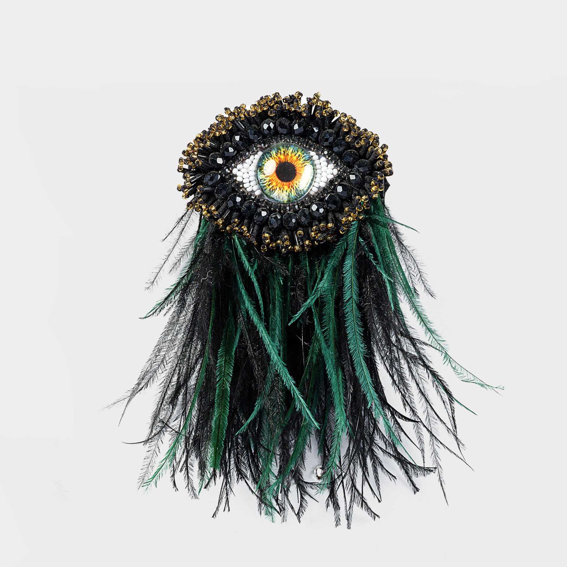 Feathered Green Eye Brooch