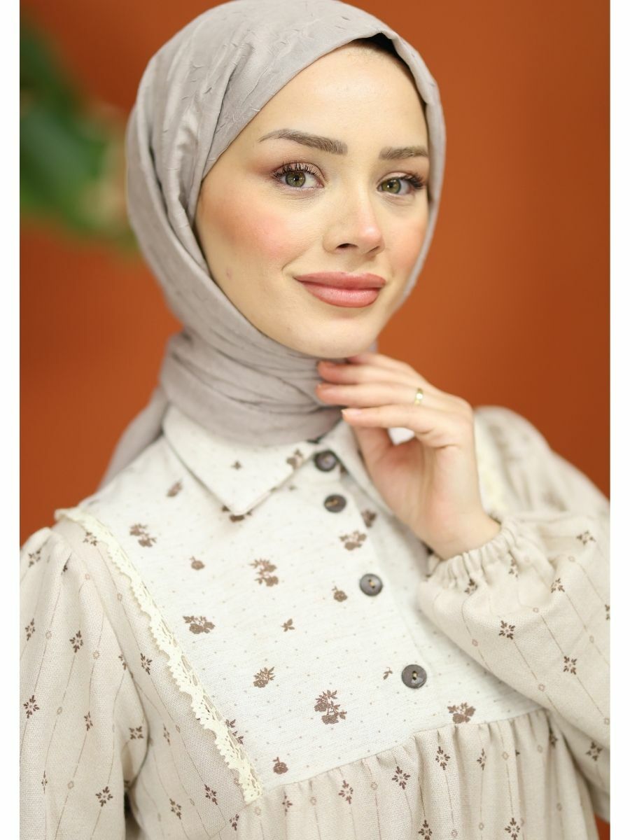 Tesettür Kombinlerinde Moda ve İşlevsellik: Tunik, Elbise ve Takım Uyumu