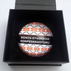 Dünya Etnospor konfederasyonu - Kutusunda kağıt ağırlığı
