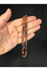 GÜMÜŞ İŞLEMELİ ATEŞ KEHRİBAR TESBİH SARI SİYAH RENKLİ KESME KESİM 10,5MMX5,5MM T-648