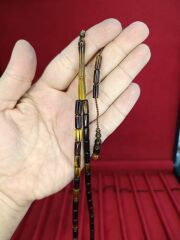 TOZ KEHRİBAR TESBİH KESME KESİM SARI SİYAH RENKLİ SİSTEMLİ 11MMX5MM ÖZEL ÖLÇÜ