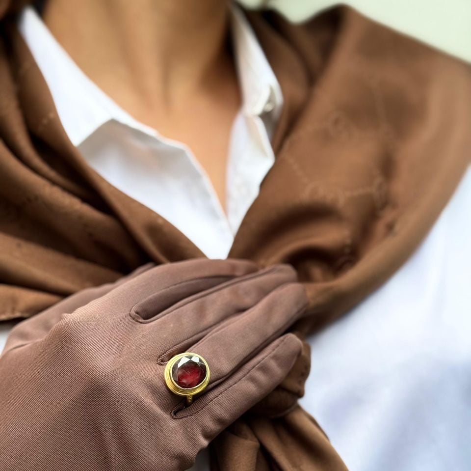 GOLD PLATED SILVER RING WITH RUBY STONE.