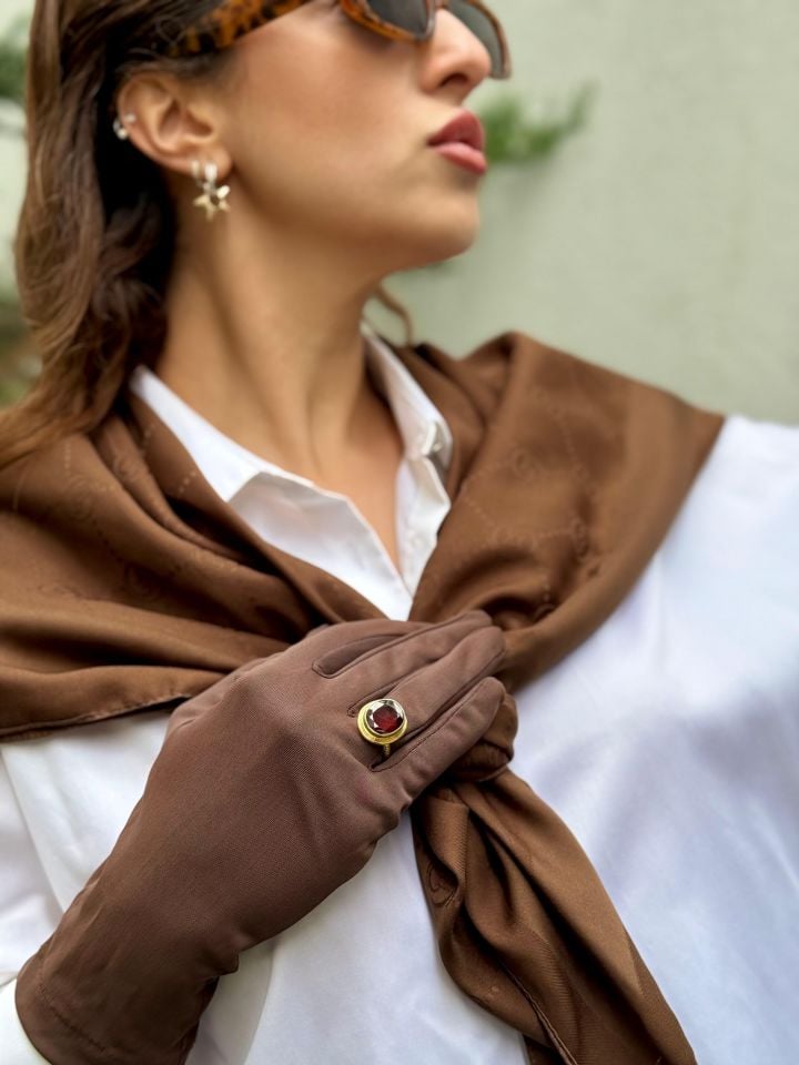 GOLD PLATED SILVER RING WITH RUBY STONE.