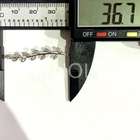 3,6cm. KRİSTAL YAPRAKLI BİLEKLİK APARATI