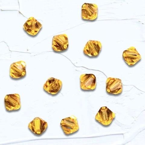 6mm. BRONZ PİRAMİD KRİSTALİ PAKET