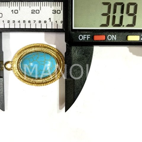 3,1cm. KALIN ÇERÇEVELİ ELİPS TURKUAZ KOLYE UCU