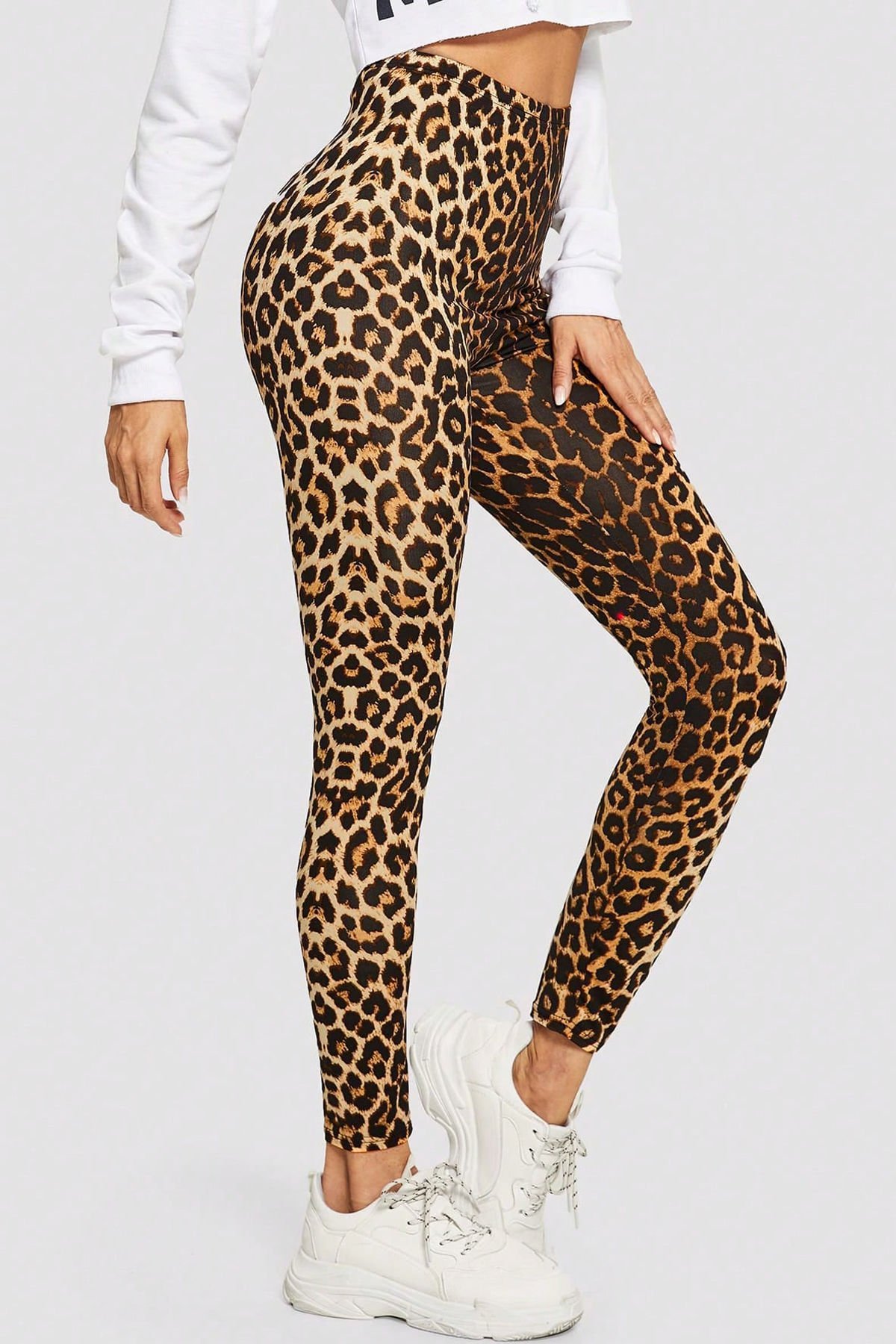 Kadın Leopar Desenli Yüksek Bel Dar Kesim Esnek Tayt – Modern ve Şık Tasarım