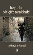 KAPIDA BİR ÇİFT AYAKKABI