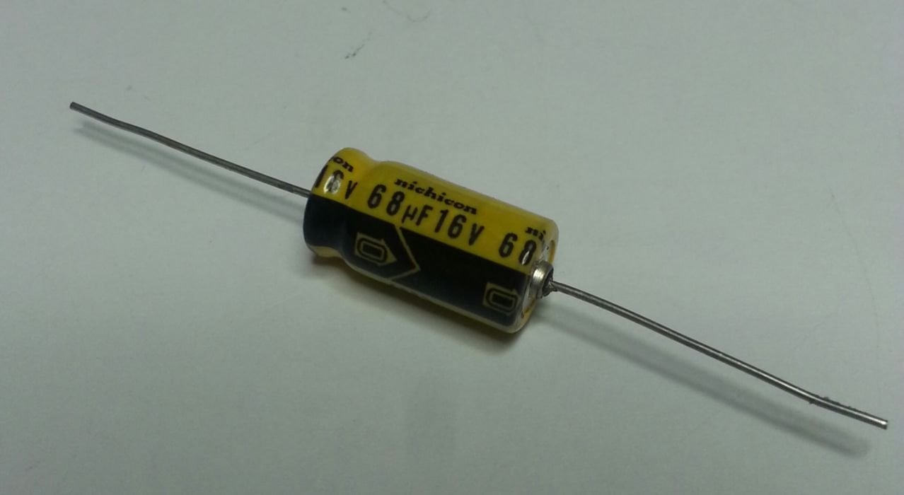 68uF16V 7x15mm  Nıchıcom orjinal (TKB1C680MAAANALS) Aksiyel (Axial) Kondansatör