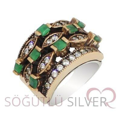 root emerald and zircon stone ring