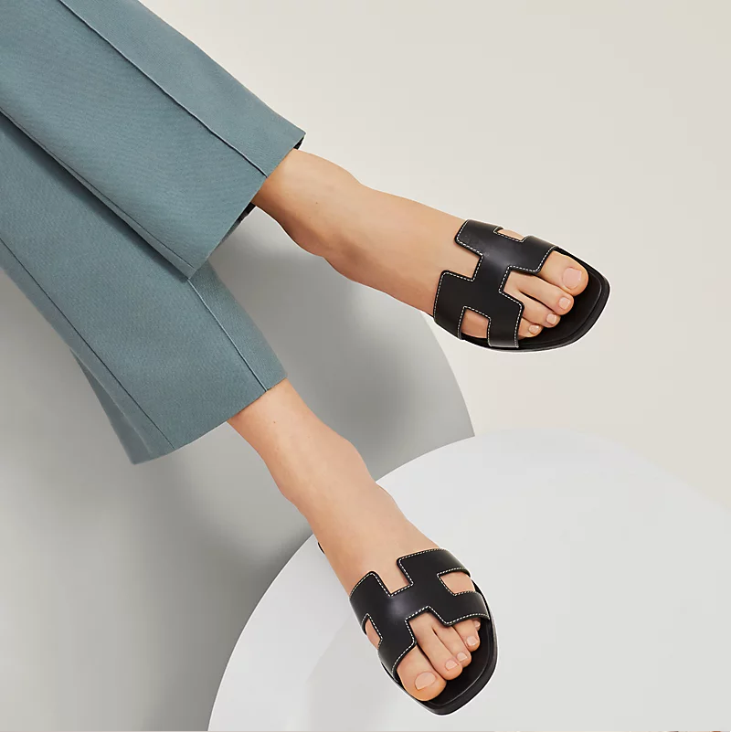 Female hermes slippers hot sale