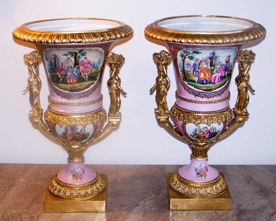 Sevres damgalı çift porselen vazo,  bronz  kaideli  Y:55 cm.