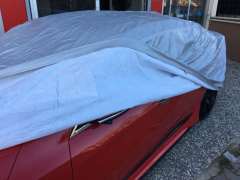 Aston martin vantage oto branda araç örtüsü doluya karşı