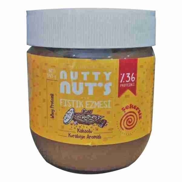 NUTTY NUT'S YER FISTIĞI EZMESİ KAKAOLU KURABİYE AROMALI WHEY PROTEİNLİ (%36) 340GR